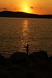 Fishing on soft sunset on Sardinia
