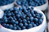 Close-up image of blueberries inside a basket