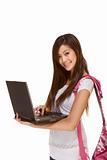 Asian student in jeans with backpack, laptop
