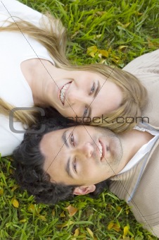 Young Couple Relaxing on a Lawn