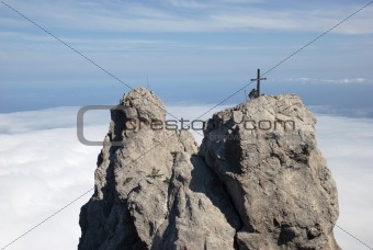 Mountain with a cross on a top