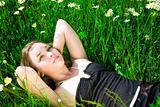 Woman Laying On The Grass