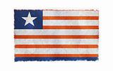 Flag of Liberia on old wall background, vector wallpaper, texture, banner, illustration