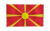 Flag of Macedonia on old wall background, vector wallpaper, texture, banner, illustration