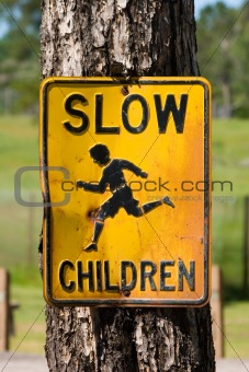 Weathed Slow Children Street Sign
