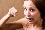 Angry Woman Throwing a Punch