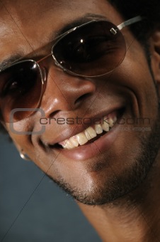 African male with toothy smile