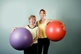 Women Posing With Exercise Balls