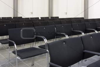 Black chairs in a row