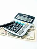 calculator pen and money